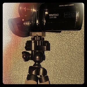 Vivitar camera , tripod and light